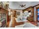 Spacious bedroom with a king-size bed, fireplace, and built-in shelving at 457 Timber Trail Rd, Breckenridge, CO 80424