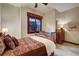 Bedroom with a queen-size bed and crib, perfect for families at 457 Timber Trail Rd, Breckenridge, CO 80424