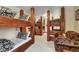 Spacious bunk room with multiple beds and sitting area at 457 Timber Trail Rd, Breckenridge, CO 80424