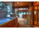 Relaxing hot tub on a covered patio, perfect for snowy evenings at 457 Timber Trail Rd, Breckenridge, CO 80424