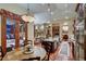 Breakfast nook area in the kitchen with hardwood floors and a view to the living room at 457 Timber Trail Rd, Breckenridge, CO 80424