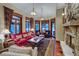 Cozy living room with a stone fireplace and comfortable seating at 457 Timber Trail Rd, Breckenridge, CO 80424