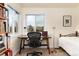 Bedroom featuring desk with natural views and hardwood floors at 6 White Alder, Littleton, CO 80127