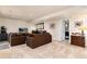 Inviting living room featuring a wet bar and comfortable seating for relaxing or entertaining at 6 White Alder, Littleton, CO 80127