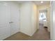 Hallway with carpeted floor and large closet that leads to a bedroom at 1334 Barberry Trl, Elizabeth, CO 80107
