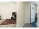 Bright room with a stylish rug and a desk set up for work or gaming at 1334 Barberry Trl, Elizabeth, CO 80107