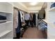 Spacious walk-in closet with custom shelving, hanging racks, and ample storage space at 1334 Barberry Trl, Elizabeth, CO 80107