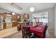 The eat-in-kitchen features a dining room and kitchen area at 1418 5Th St, Fort Lupton, CO 80621