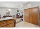 Open layout connecting the kitchen, dining and living spaces at 1418 5Th St, Fort Lupton, CO 80621
