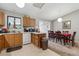 The kitchen and dining area offer a cozy and connected space at 1418 5Th St, Fort Lupton, CO 80621