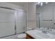 This bathroom boasts a shower-tub combination, vanity, and mirror at 3515 S Dawson St, Aurora, CO 80014