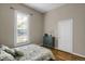 Bedroom with hardwood floors and a vintage-style cabinet at 2415 Chase St, Edgewater, CO 80214