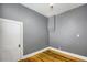 Empty bedroom with hardwood floors and white trim at 2415 Chase St, Edgewater, CO 80214
