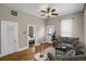 Charming living space featuring hardwood floors and neutral paint, creating a bright and welcoming atmosphere at 2415 Chase St, Edgewater, CO 80214