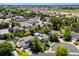 A view of the neighborhood, showcasing mature landscaping and residential charm at 12555 Eastlake Dr, Thornton, CO 80241