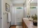 Bright full bathroom features shower/tub combo and vanity with decorative touches at 12555 Eastlake Dr, Thornton, CO 80241