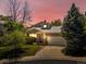 Charming home featuring a manicured lawn, mature trees, and a two-car garage at 12555 Eastlake Dr, Thornton, CO 80241