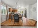 Bright eat-in kitchen area with hardwood floors and stainless steel appliances at 12555 Eastlake Dr, Thornton, CO 80241