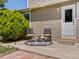 Inviting patio area featuring outdoor seating and a well-manicured yard, ideal for relaxation at 12555 Eastlake Dr, Thornton, CO 80241