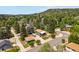 Charming home with lush surroundings, a detached garage, and well-maintained landscaping at 403 Anderson St, Castle Rock, CO 80104