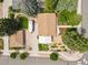 Overhead view of property highlighting a spacious house, garage, Airstream, and manicured lawn at 403 Anderson St, Castle Rock, CO 80104