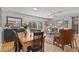 Open concept living and dining area with hardwood floors and stylish decor at 403 Anderson St, Castle Rock, CO 80104