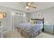 Bedroom featuring a ceiling fan, bright windows, and stylish decor at 403 Anderson St, Castle Rock, CO 80104