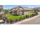 Spacious backyard with lush green lawn, privacy fence, and large back porch deck at 22891 E Union Cir, Aurora, CO 80015