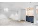Spacious basement with a wet bar, offering potential for a recreation room or additional living area at 1335 Jasmine St, Denver, CO 80220