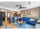 Open floor plan with living room connected to an updated kitchen with stainless appliances and bar seating at 1833 N Williams St # 201, Denver, CO 80218