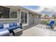 Relaxing back deck with wicker seating, ideal for enjoying the outdoors and entertaining guests at 3841 W Quinn Pl, Denver, CO 80236