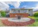 Backyard with a patio and grill, perfect for entertaining, and a deck with white railings for relaxation at 3841 W Quinn Pl, Denver, CO 80236