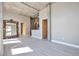 Bright, open living space with concrete pillars, hardwood style floors and oversized mirror at 1475 Delgany St # 807, Denver, CO 80202