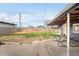 Large backyard space with grass, a wood fence and a picnic table at 5103 Quitman St, Denver, CO 80212