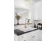 Close-up of a kitchen sink area with elegant fixtures and ample counter space for food preparation at 5103 Quitman St, Denver, CO 80212