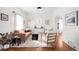 Bright and airy living room with hardwood floors, modern furniture, and ample natural light for a cozy atmosphere at 5103 Quitman St, Denver, CO 80212
