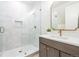 Beautiful bathroom featuring a glass shower and elegant fixtures at 1120 S Gaylord St, Denver, CO 80210