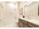 Well-appointed bathroom with integrated tub, stand-alone sink, and luxury fixtures at 1120 S Gaylord St, Denver, CO 80210