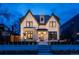 Elegant two-story home showcasing its beautiful white brick facade and modern architectural design at 1120 S Gaylord St, Denver, CO 80210