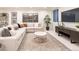Comfortable living room featuring an L-shaped couch and decorative accents at 1120 S Gaylord St, Denver, CO 80210