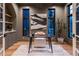 Stylish home office with custom desk, large windows, and modern decor at 1120 S Gaylord St, Denver, CO 80210