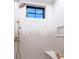 Modern shower with sleek fixtures, stylish tiling, a built-in bench, and a window at 1120 S Gaylord St, Denver, CO 80210