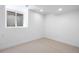 Unfinished basement area with a window, offering potential for customization and additional living space at 4745 N Clay St, Denver, CO 80211