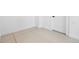 Spacious basement area featuring a sleek epoxy floor and access door, perfect for customization at 4745 N Clay St, Denver, CO 80211
