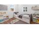 Cozy bedroom with a twin bed, lots of storage, and natural light, perfect for a  at 4745 N Clay St, Denver, CO 80211