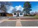Charming home featuring a manicured, low-maintenance front yard with gravel landscaping and a freshly painted exterior at 4745 N Clay St, Denver, CO 80211