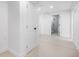 Bright hallway leading to a stylish bathroom and other rooms within the home at 4745 N Clay St, Denver, CO 80211
