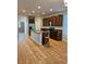Spacious kitchen with modern stainless steel appliances, granite countertops, and ample cabinet space at 23014 Milford Ln, Parker, CO 80138