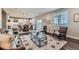 Spacious living area with view to the kitchen and dining room with lots of natural light at 38 Morgan Cir, Erie, CO 80516