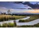 Scenic pathway through a lush green landscape, perfect for a relaxing stroll at 38 Morgan Cir, Erie, CO 80516